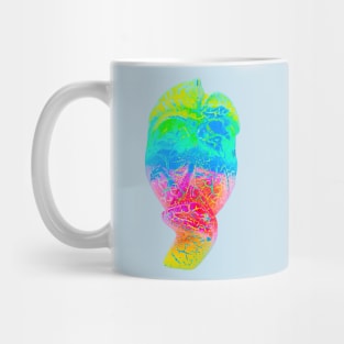 A bright multicolored Bali face mask cut out Mug